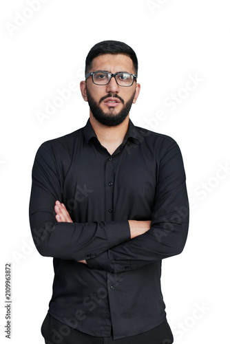 Young handsome business man dressed in casual denim shirt with smartwatch on wrist