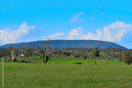 Mount Duval, a large forested mountain of the New England Range, part of the Great Dividing Range, is located on the Northern Tablelands in the New England region- landscape with mountains and clouds 