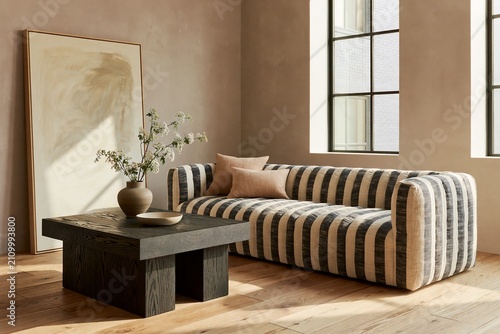 Living room featuring a striped sofa with warm taupe limewash walls, a dark wooden coffee table, and a large abstract painting in a modern interior setting