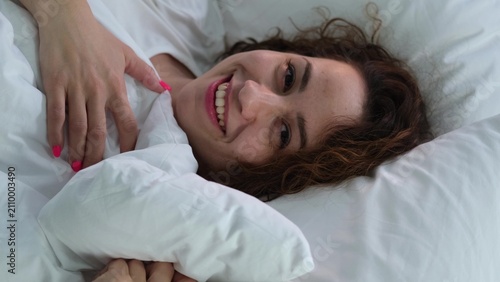 фотографія Young woman sleeping in bed