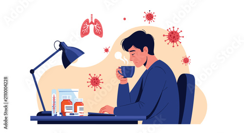 Sick young man with coronavirus symptoms works on a laptop computer at his desk with medical supplies, pills, and hot tea.