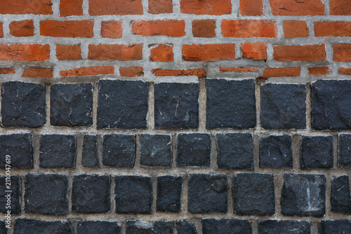 Red and Black stone wall background - construction concept