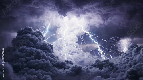 Violent lightning strikes illuminating dark storm clouds during intense atmospheric weather event with video cinematic powerful lightning bolts flashing through dense