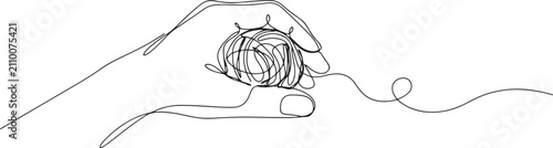 Schilderij op canvas a human hand holding a tangled ball of messy thread