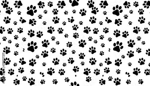 Seamless pattern with black paw prints