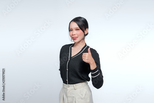 Canvas Print Smiling Indonesian Woman Giving Thumbs Up