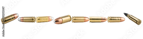 Fotografie Row of shiny metallic gun bullets isolated on white background