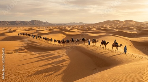 A camel caravan crosses golden desert dunes with guides at sunset, suited to travel advertising, adventure tours, or cultural tourism campaigns.