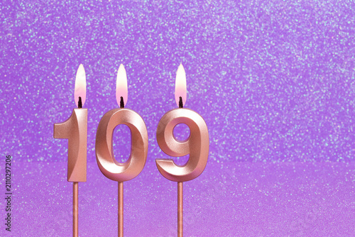 Obraz na plátne Number 109 on a pink background with blurred bright dots