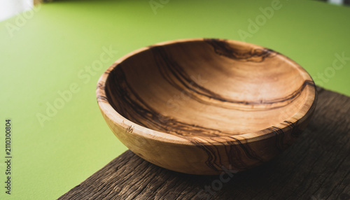 Close Up of Wooden Bowl on Rustic Table.