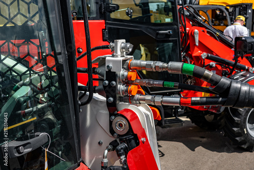 Obraz na plátně Skid steer loader hydraulic quick disconnect couplings on arm