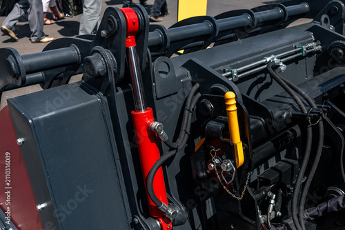 Canvas Print Skid steer loader attachment quick coupler with locking lever