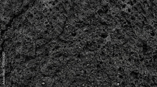 Close-up of Dark Textured Granite Surface for Design and Decoration.