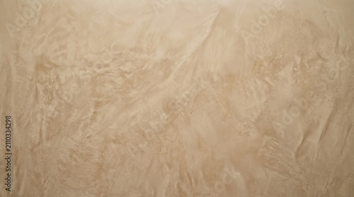 Close-up of Textured Beige Wall Surface for Background Design.