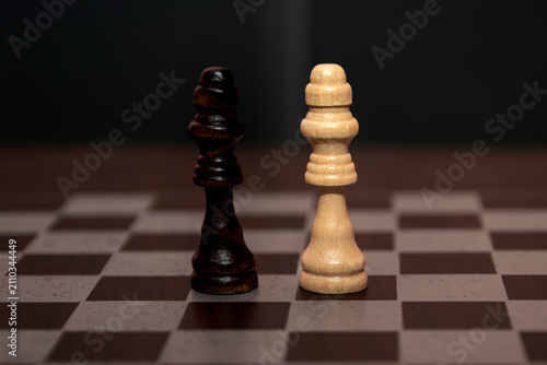 Fotografie White King and Black King Facing Each Other on Chessboard