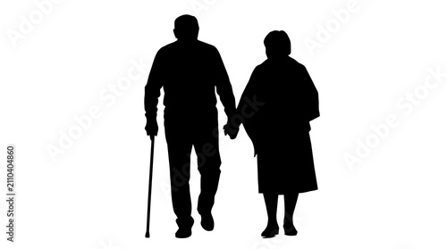 Foto Silhouette of an elderly couple holding hands while walking together with a cane
