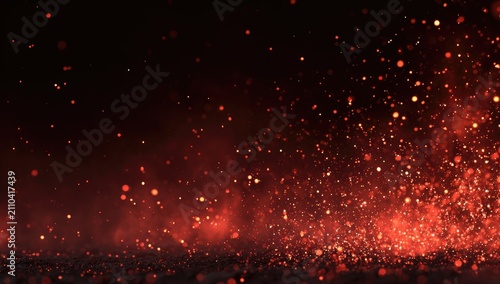 Fiery abstract background with particles emitting a soft glow against a dark gradient. Dynamic, blurred effect