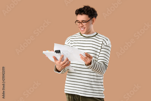 Male screenwriter reading s...