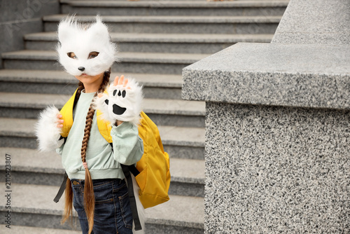 Quadrober girl in cat mask ...