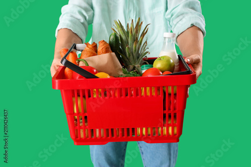 Young man with full shoppin...