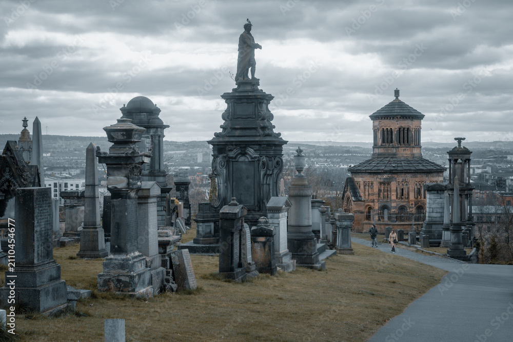 Obraz premium wide angle view of Glasgow Necropolis and Glasgow Cathedral area at overcast weather