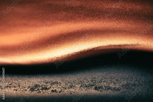 Deep orange and black abstract gradient with heavy gritty texture and a soft flowing wave for a cosmic cinematic background