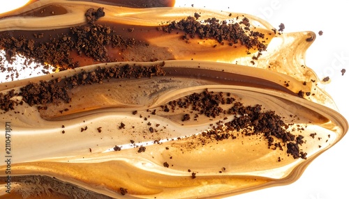 Abstract macro shot showcasing flowing, swirling coffee-like liquids with scattered dark, granular solids against a white background