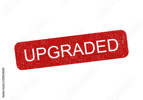 Red rectangular rubber stamp icon with the word upgraded in white text isolated on transparent background
