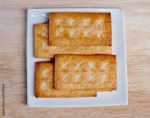 Billede på lærred The breadsticks were arranged on a plate