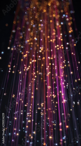 Fiber optic cables glowing with colorful light in a vertical macro shot for telecommunications and digital infrastructure marketing