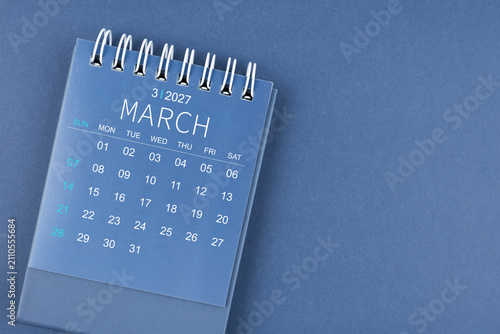 March 2027 calendar on blue color background. Desk calendar for planning.
