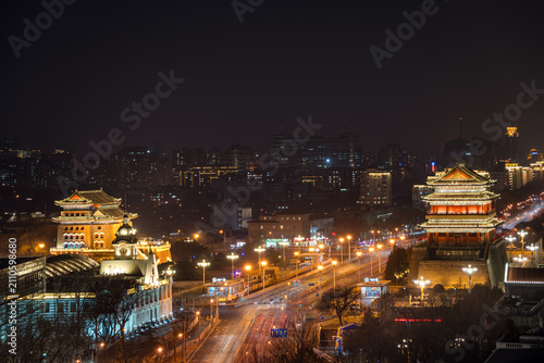 Fotografie The ancient buildings of Qianmen in Beijing, China, are brightly lit, a city night view from an aerial perspective