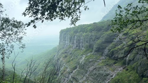 Spectacular 4K landscape of a windy valley in the Western Ghats with clouds, forests, and green mountains.