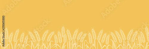 Quadro su tela Wheat Field Border on a Yellow Background agriculture