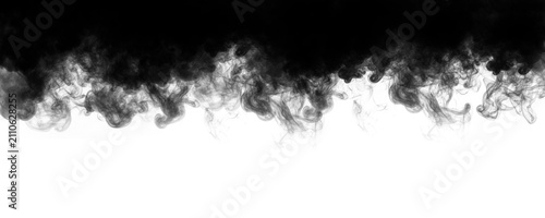 Foto Wispy black smoke curls downward from the dark upper edge creating a dramatic ab
