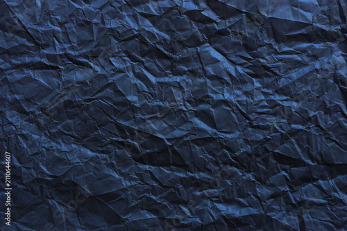Abstract black crumpled paper texture