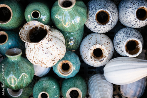 Quadro su tela Assorted handmade ceramic vases pattern viewed from above