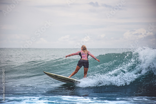 Photography Woman Surfing High Waves in a Tropical Ocean Paradise