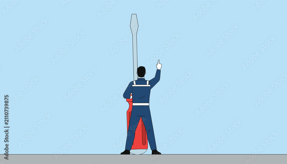 Fototapeta premium Industrial worker in blue overalls pointing up while standing next to a giant red flathead screwdriver.