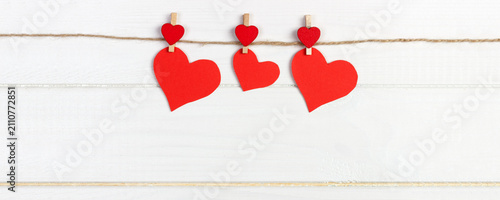 Foto Love paper heart on string. Valentine day concept, copy space
