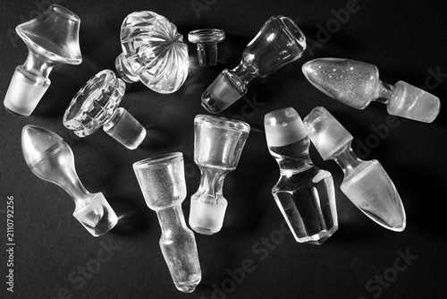 vintage crystal bottle caps on a black background