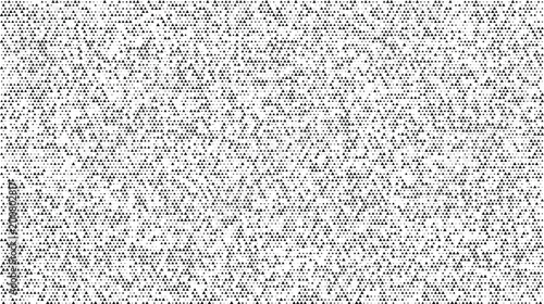 Fotografie Black and white halftone texture with a uniform distribution of small circular d