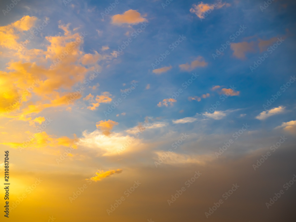 Fototapeta premium Sky sunset evening sunrise cloud weather dramatic landscape goldent and indigo color gradient pastel horizon, twilight yellow golden reflection morning nature environment energy ecosystem change