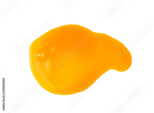 Spilled orange juice isolated, mango smoothie puddle, liquid stain, carrot juice splatter