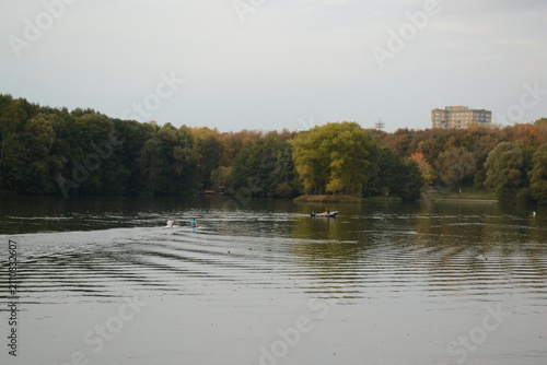 Park in the evening, fountains, lake, river