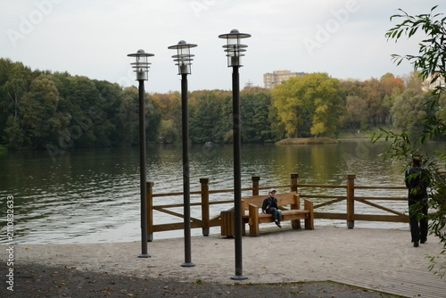 Park in the evening, fountains, lake, river