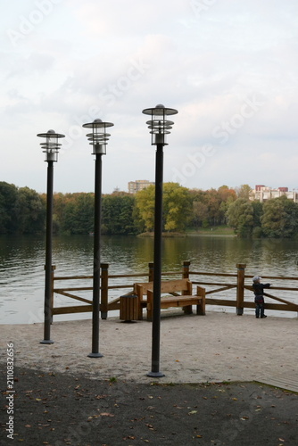 Park in the evening, fountains, lake, river
