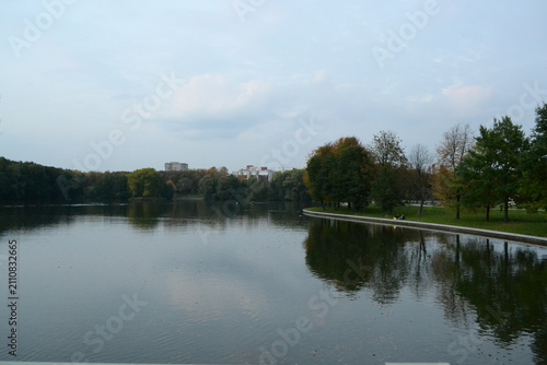 Park in the evening, fountains, lake, river