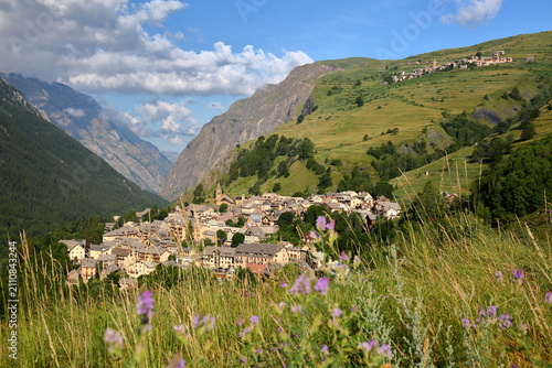 The picturesque village La Grave, Romanche Valley, Hautes Alpes (French Southern Alps), France, with the hamlet Les Terrasses in the background on the right