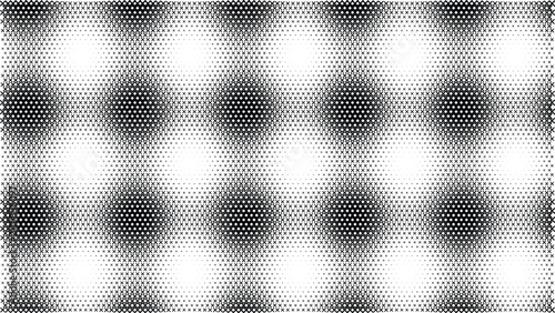 Foto Grid of circular halftone spots, alternating black and white gradient pattern on